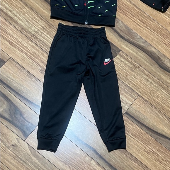 Nike Black Tracksuit with Red, Green and Yellow Accents. - Picture 5 of 9